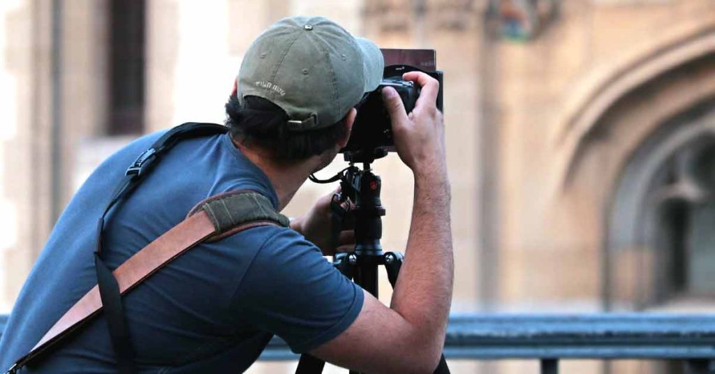 Photographer taking photos to sell online