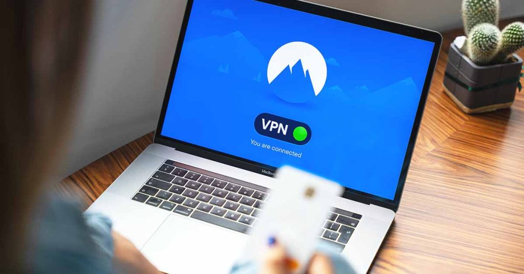 Person using VPN on laptop