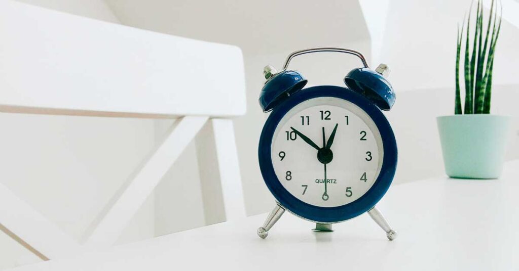 Image of alarm clock on table